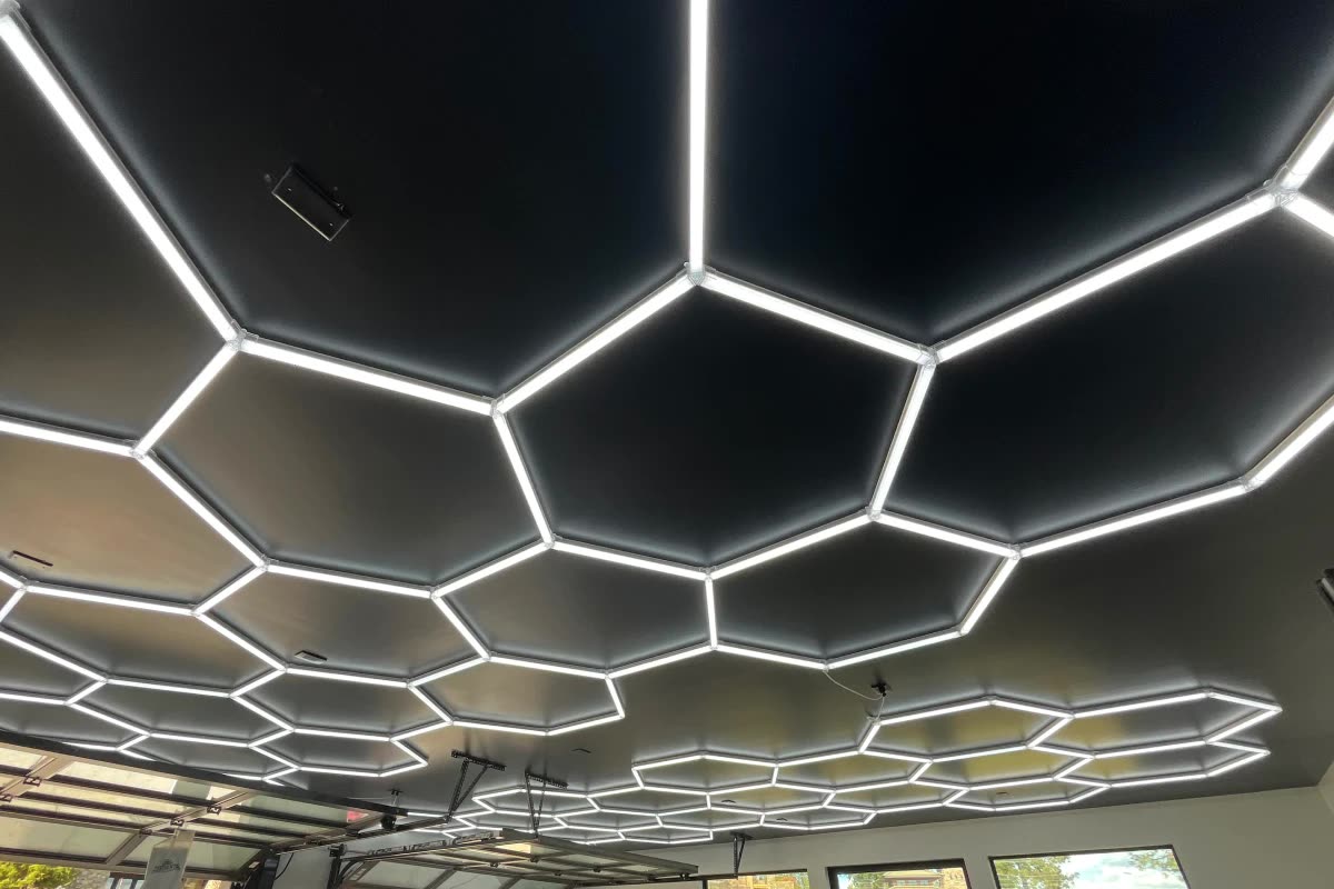 Hexagon LED ceiling lighting installed in a shop