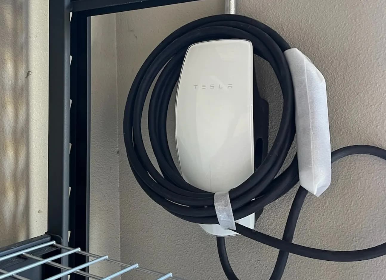 Tesla Wall Connector installed in a garage